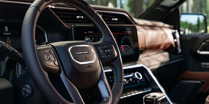 2026 GMC Sierra 1500 steering wheel with infotainment and driver controls West jefferson, NC